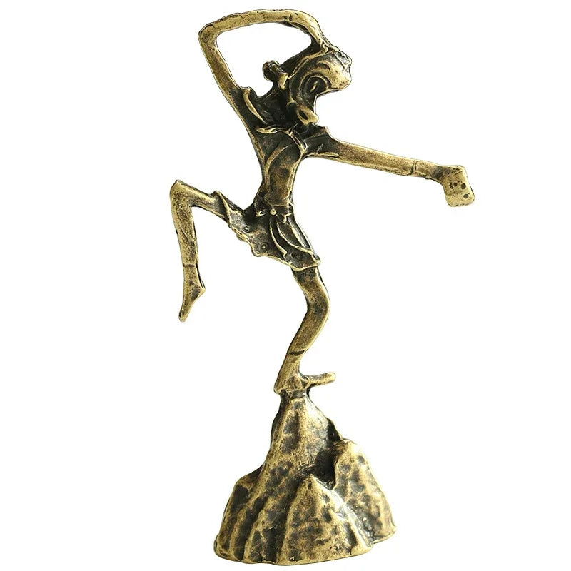 Bronze sculpture of a dancer on a white background