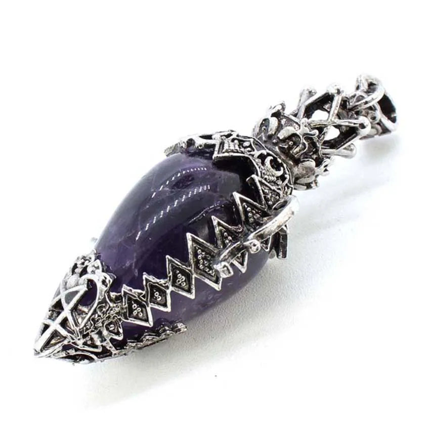 Purple stone pendant with silver decorative elements on a white background