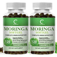 Two bottles of Moringa Softgel dietary supplements on a white background