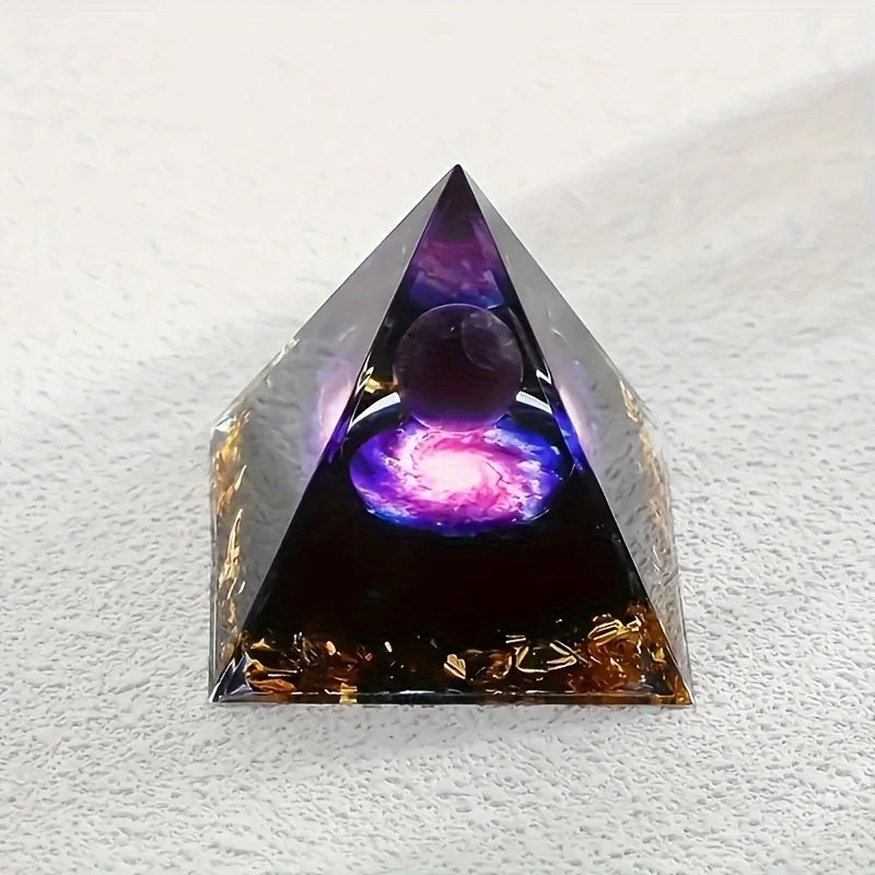 Pyramid-shaped crystal with a glowing purple center on a white background