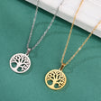 Two tree-shaped pendants on chains against a teal background