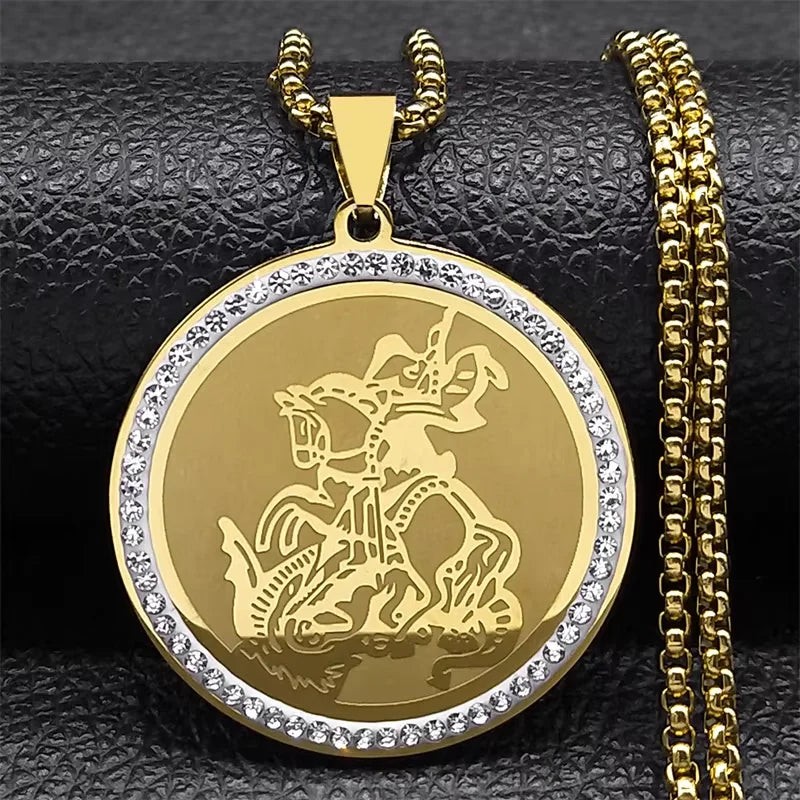 Gold pendant with a horse and rider design on a black textured background