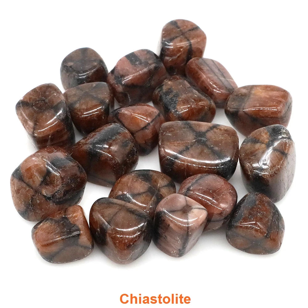 Collection of chiastolite stones on a white background