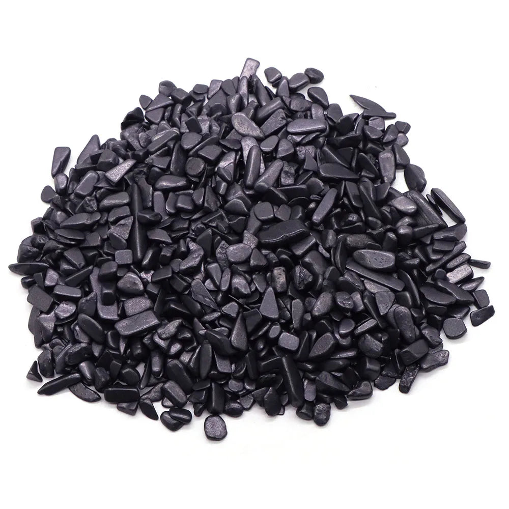 Pile of black pebbles on a white background