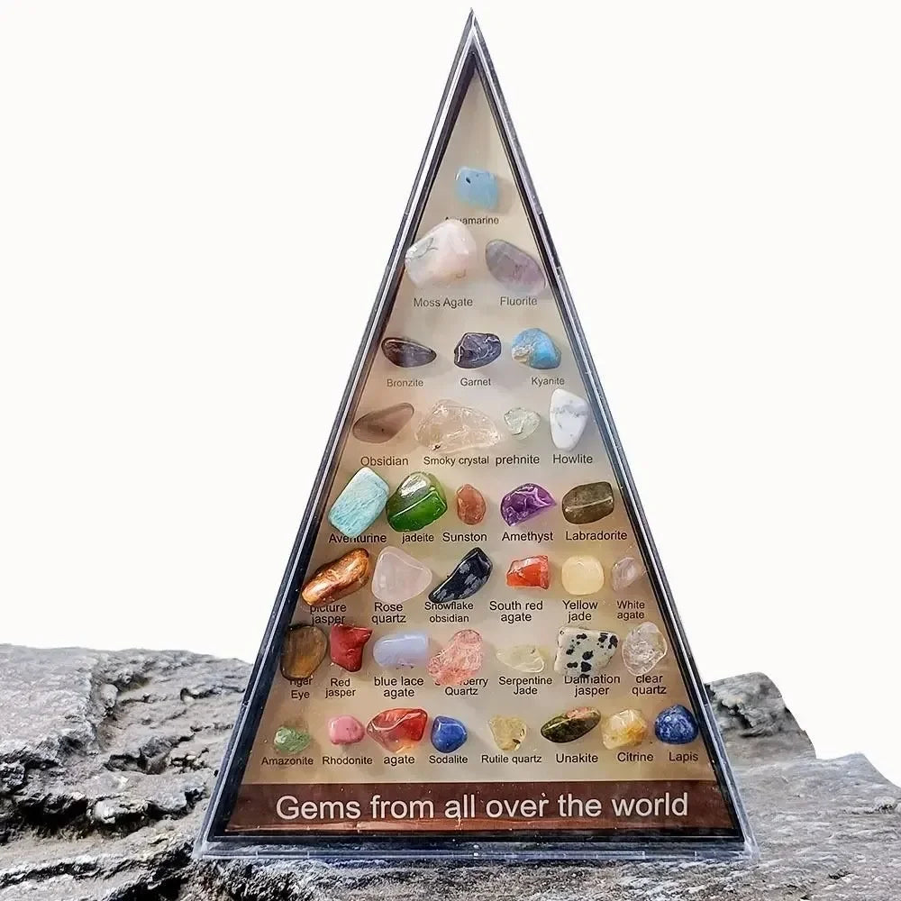 Pyramid-shaped display of gemstones from around the world on a rock background