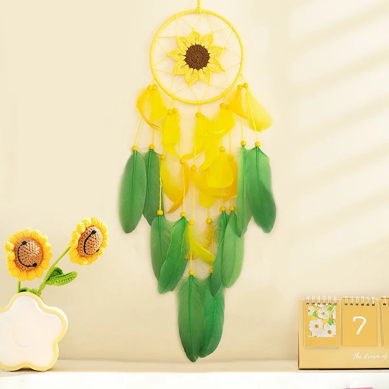 Decorative dreamcatcher with sunflower design on a beige wall.