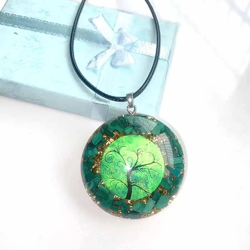 Necklace with a green tree pendant on a white background