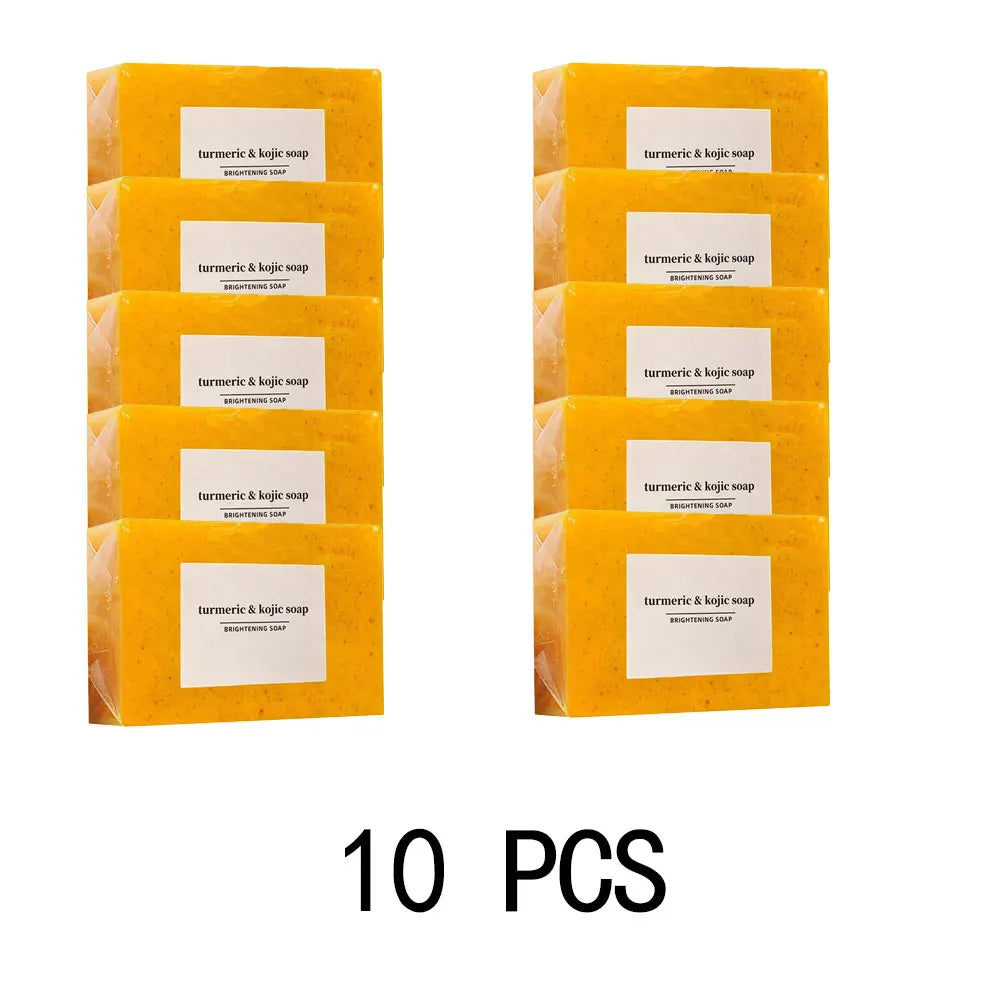Two stacks of yellow boxes labeled 'turmeric & kojic soap' with a total of 10 pieces.