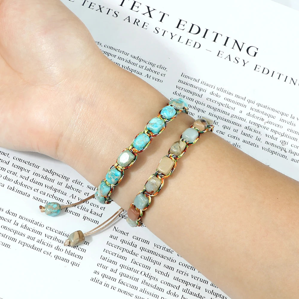 Beaded bracelet on a wrist with text in the background
