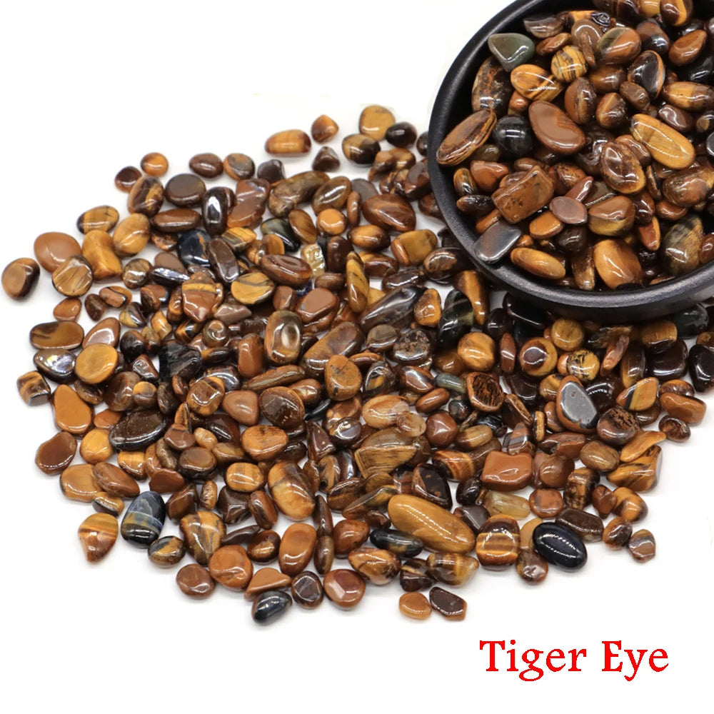 Tiger eye stones with a bowl on a white background