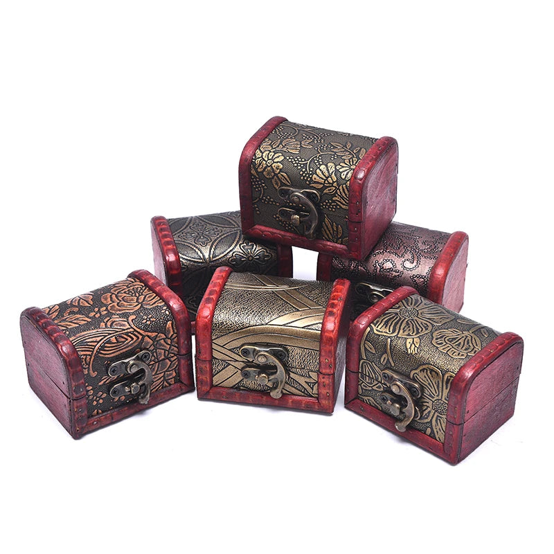 Set of decorative jewelry boxes with intricate designs on a white background