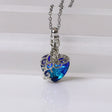 Necklace with a blue heart-shaped pendant on a white background