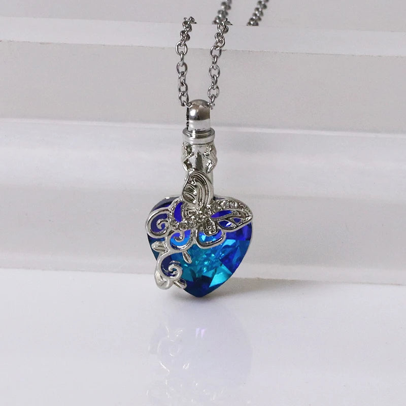 Necklace with a blue heart-shaped pendant on a white background