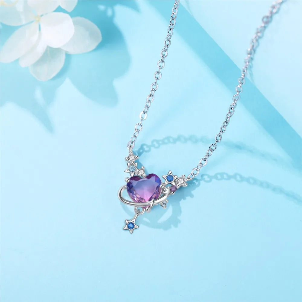Necklace with a heart-shaped purple gem on a light blue background