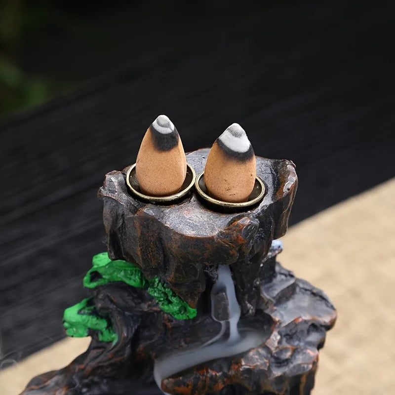 Incense cone burner with cones on a natural wood base