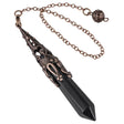 Decorative pendant with black crystal and bronze chain on a white background