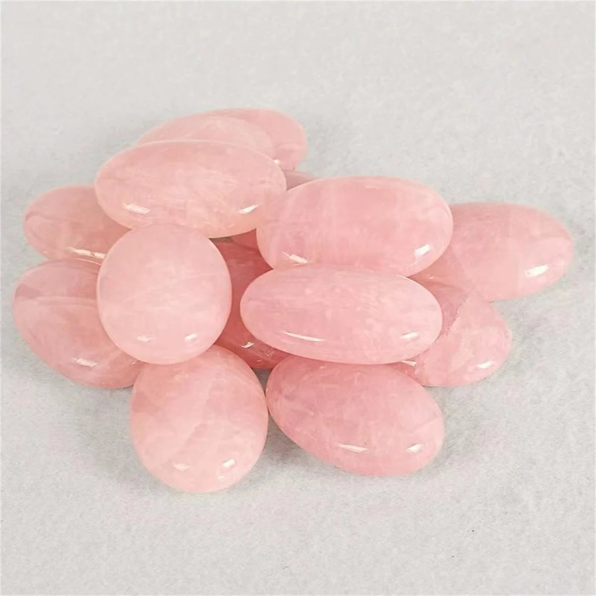 Pink stones on a light gray background