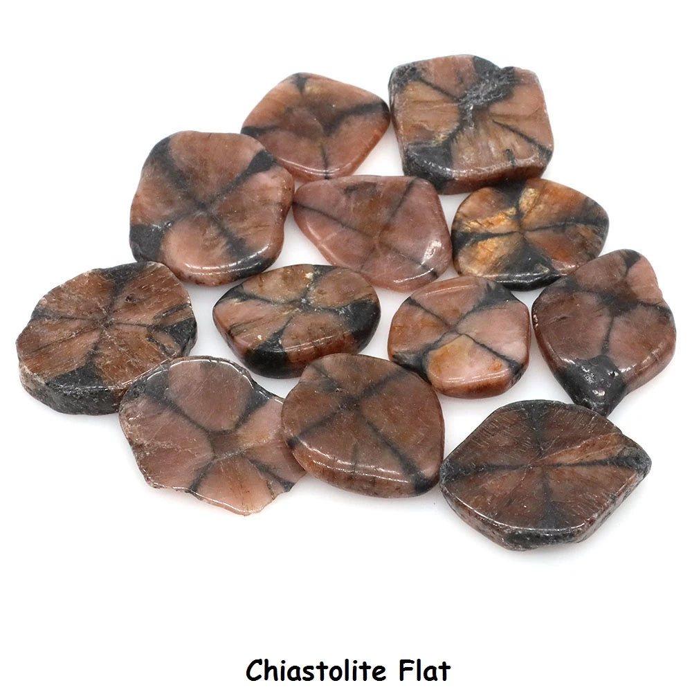 Chiastolite flat stones on a white background