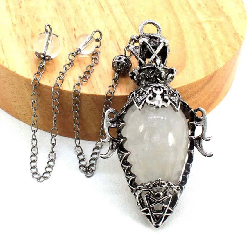 Decorative pendant with chain on a wooden surface