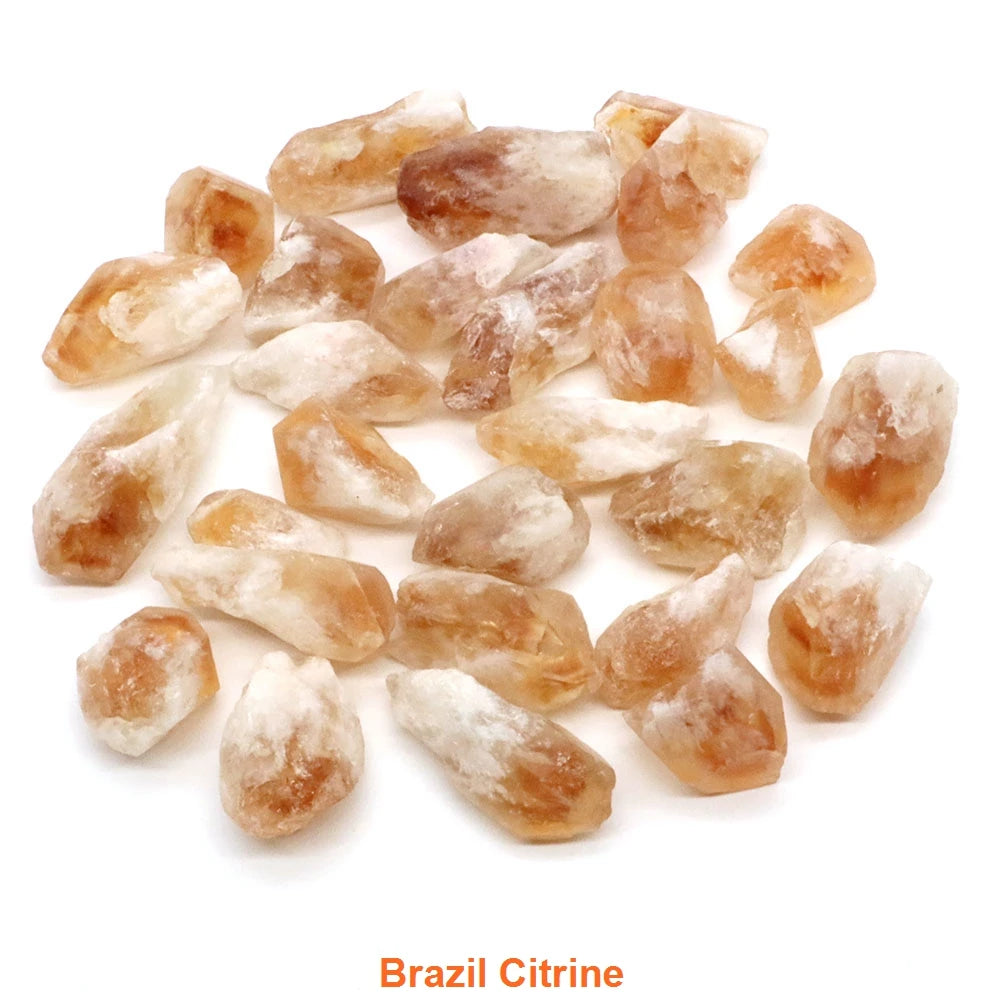Collection of Brazil Citrine stones on a white background