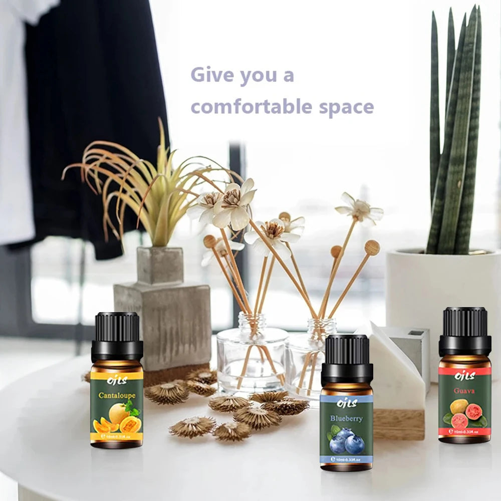 Three essential oil bottles on a table with decorative items and text 'Give you a comfortable space'.