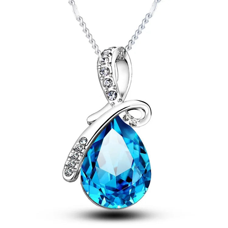 Silver necklace with a blue teardrop pendant on a white background, featuring the brand 'Giemi'.