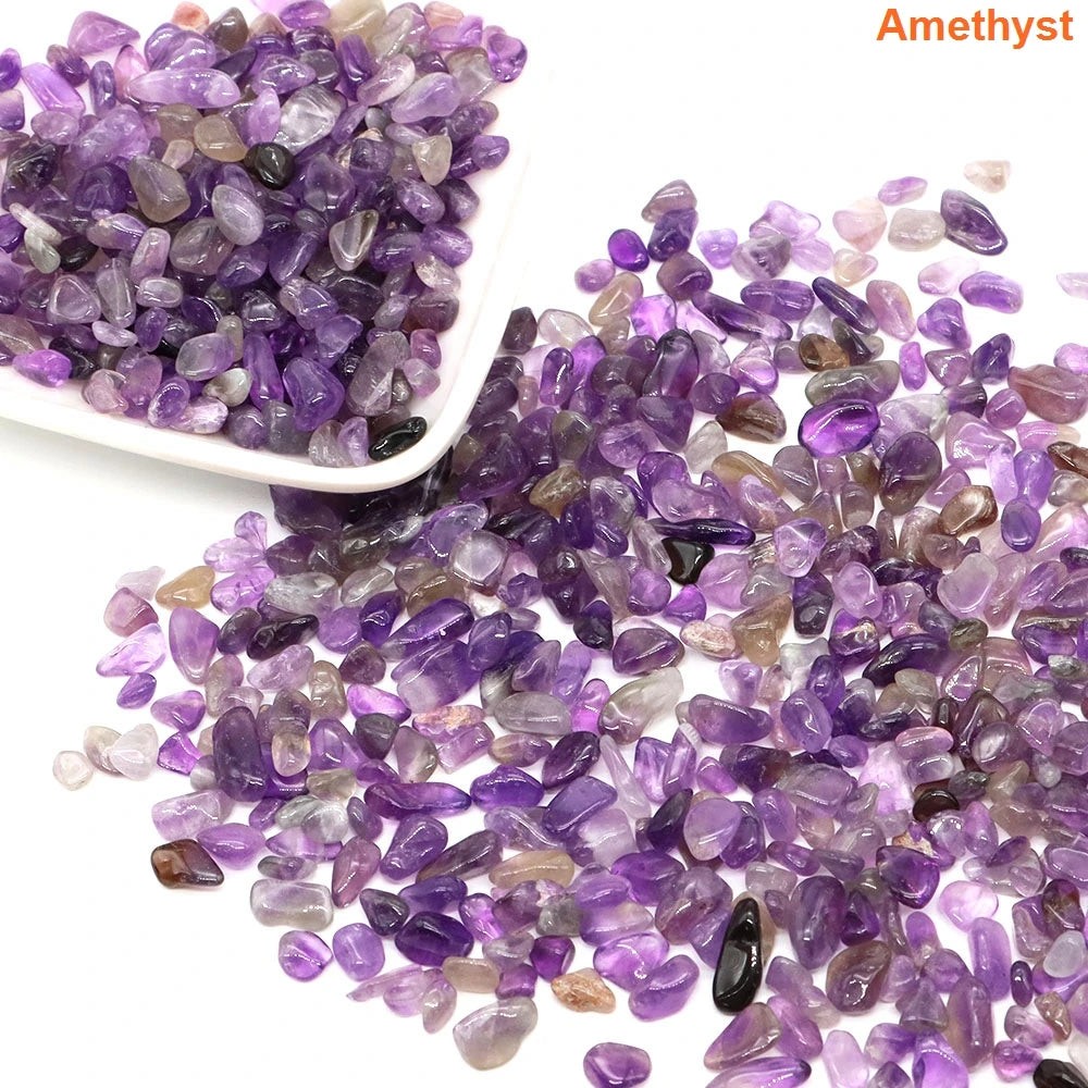 Amethyst stones with a white scoop on a white background