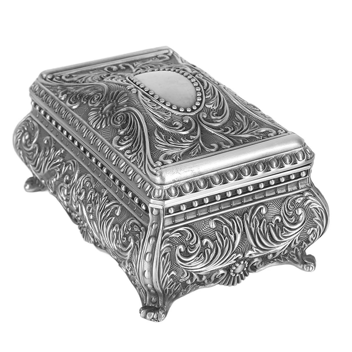Decorative silver jewelry box with intricate patterns on a white background