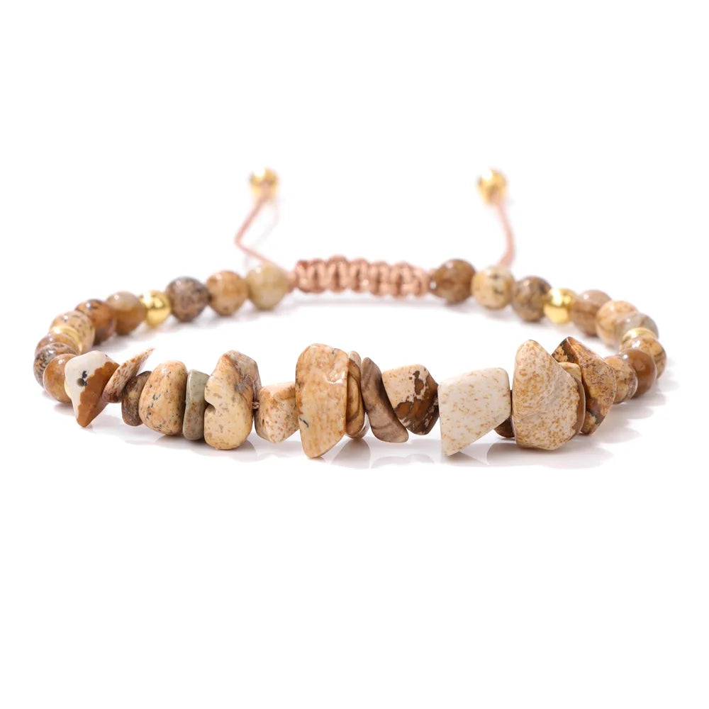Beaded bracelet with natural stone beads on a white background