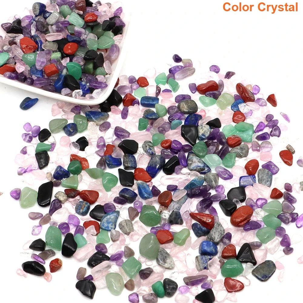 Colorful crystal stones with a white bowl on a white background
