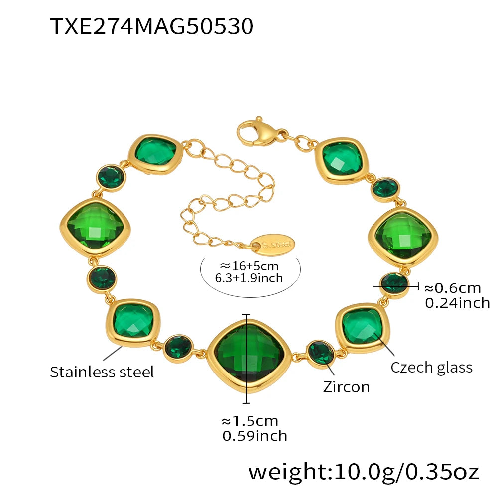 Gold bracelet with green gemstones and measurements on a white background