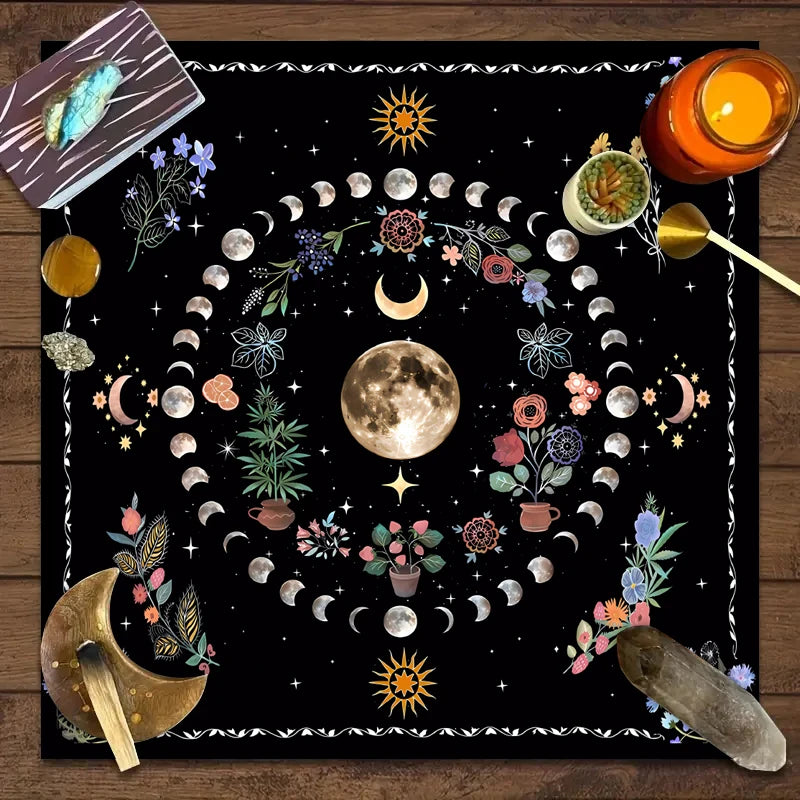 Decorative tapestry with celestial designs on a wooden surface.
