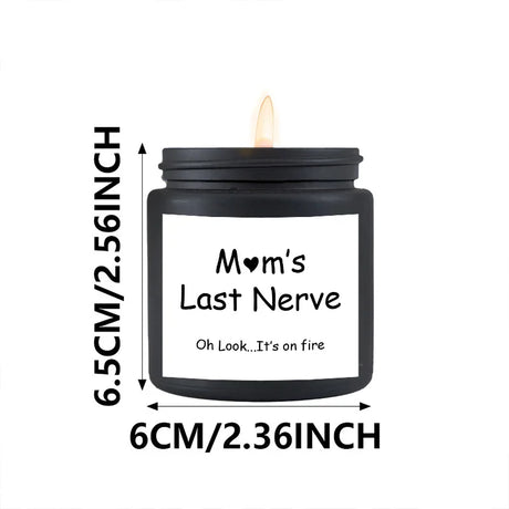Black candle jar labeled 'Mom's Last Nerve' with dimensions on a white background