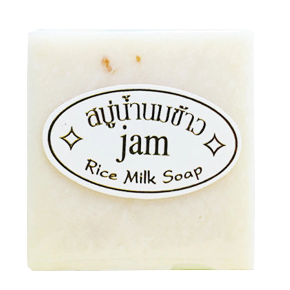 Bar of rice milk soap with a label on a white background