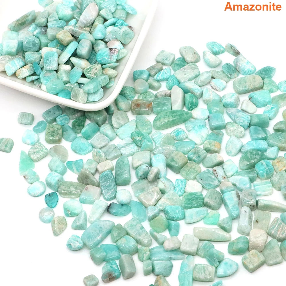 Amazonite stones with a white scoop on a white background
