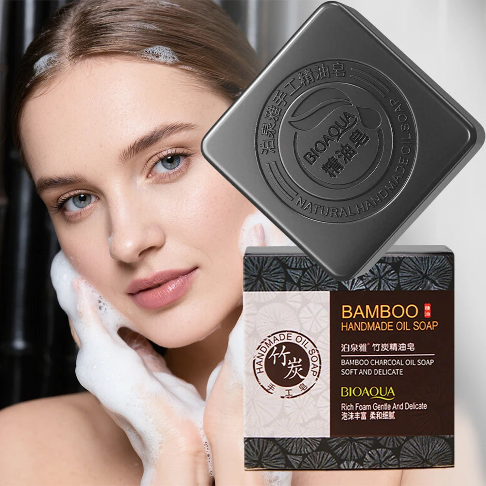 Woman washing her face with a bar of BIOAQUA bamboo charcoal oil soap.