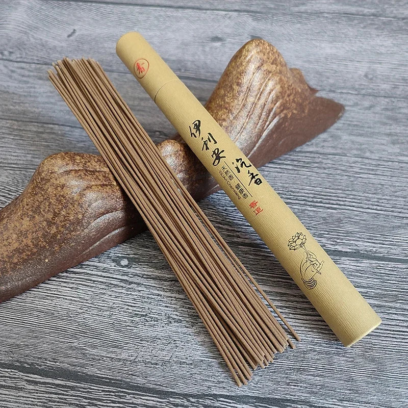 Incense sticks and their packaging on a wooden surface