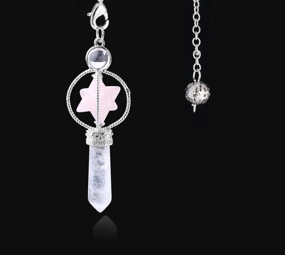 Crystal pendant necklace with star design on a black background