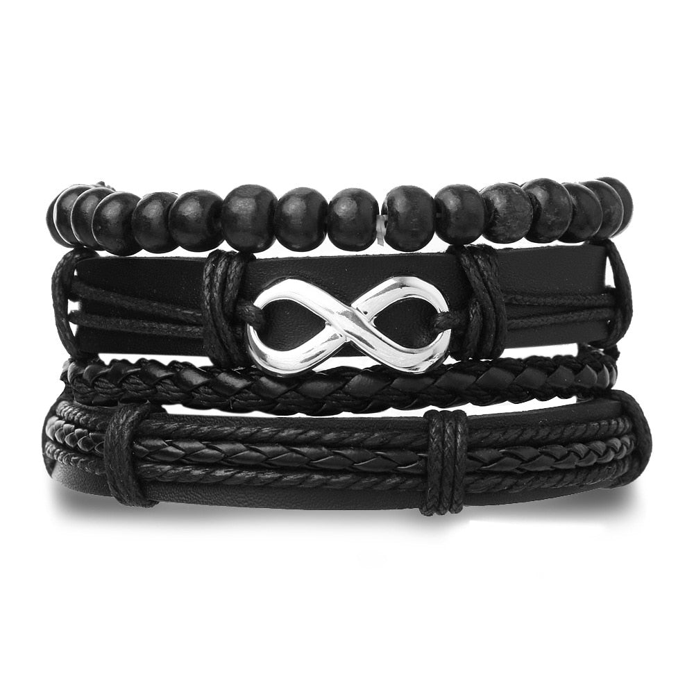 Black beaded and braided leather bracelets with an infinity symbol on a white background