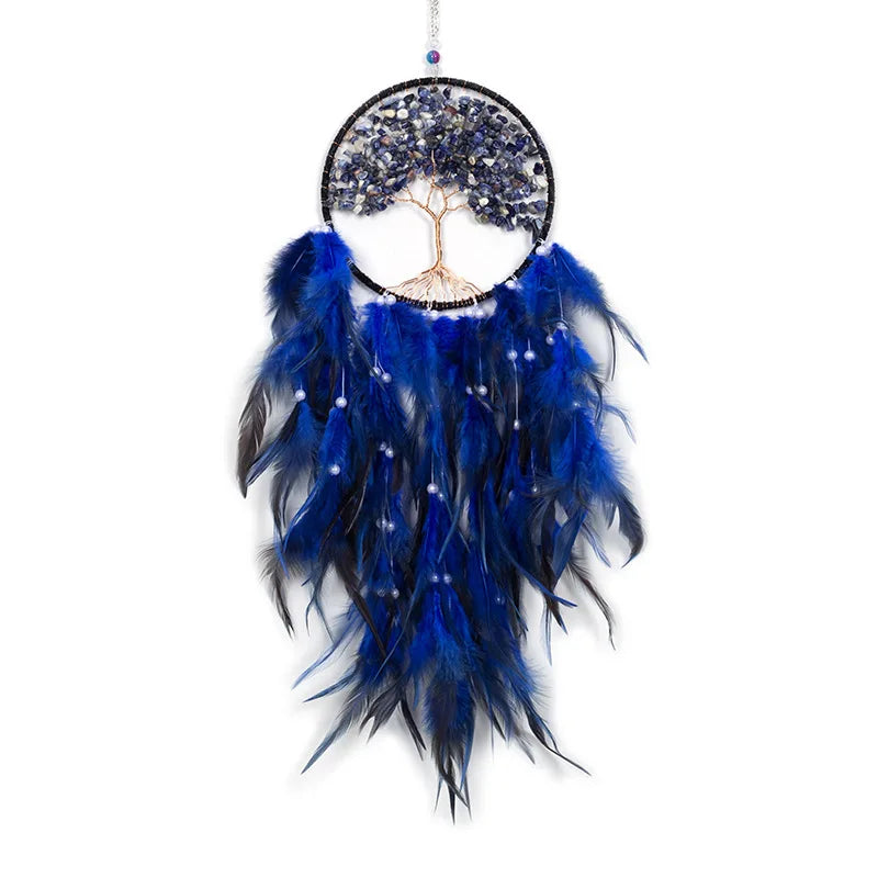Dreamcatcher with blue feathers and tree-of-life design on a white background