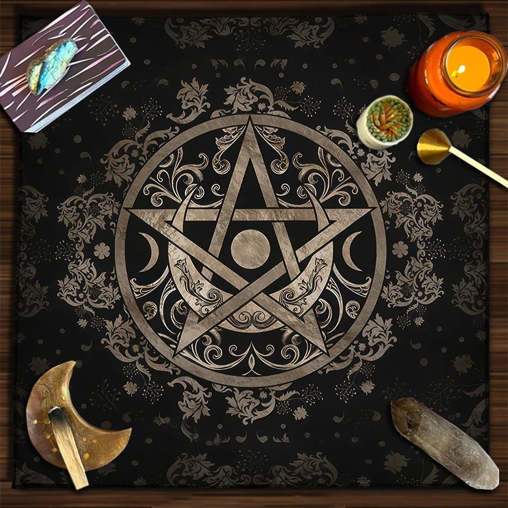 Decorative mat with a pentagram design on a wooden surface with candles and other items.