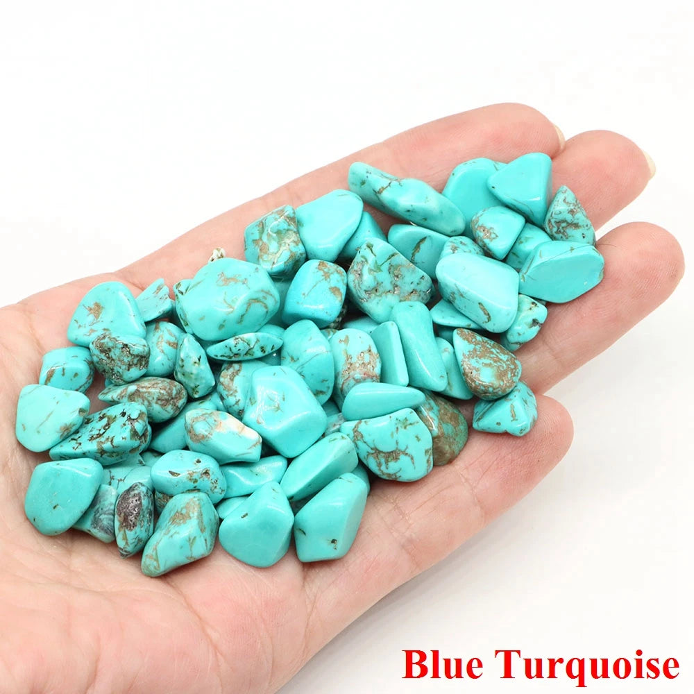 Hand holding blue turquoise stones with 'Blue Turquoise' text at the bottom.