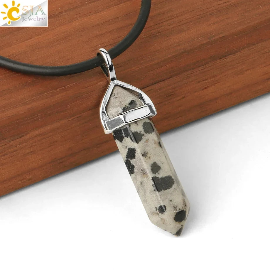 Necklace with a stone pendant on a wooden surface