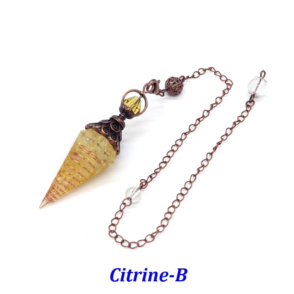 Citrine-colored pendant with chain on a white background
