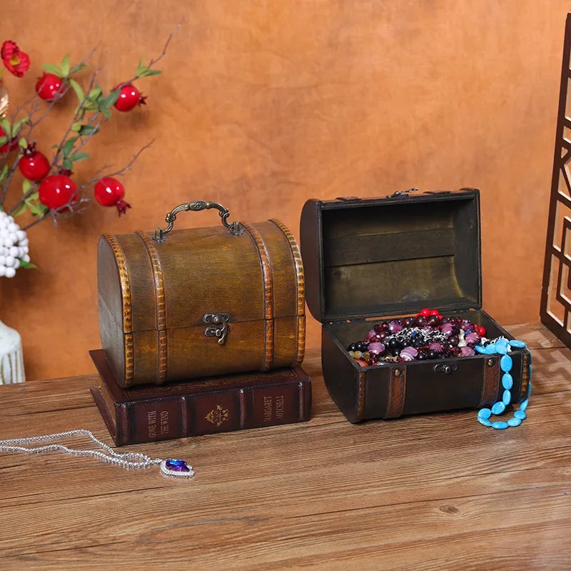 Wooden jewelry box with jewelry on a wooden surface