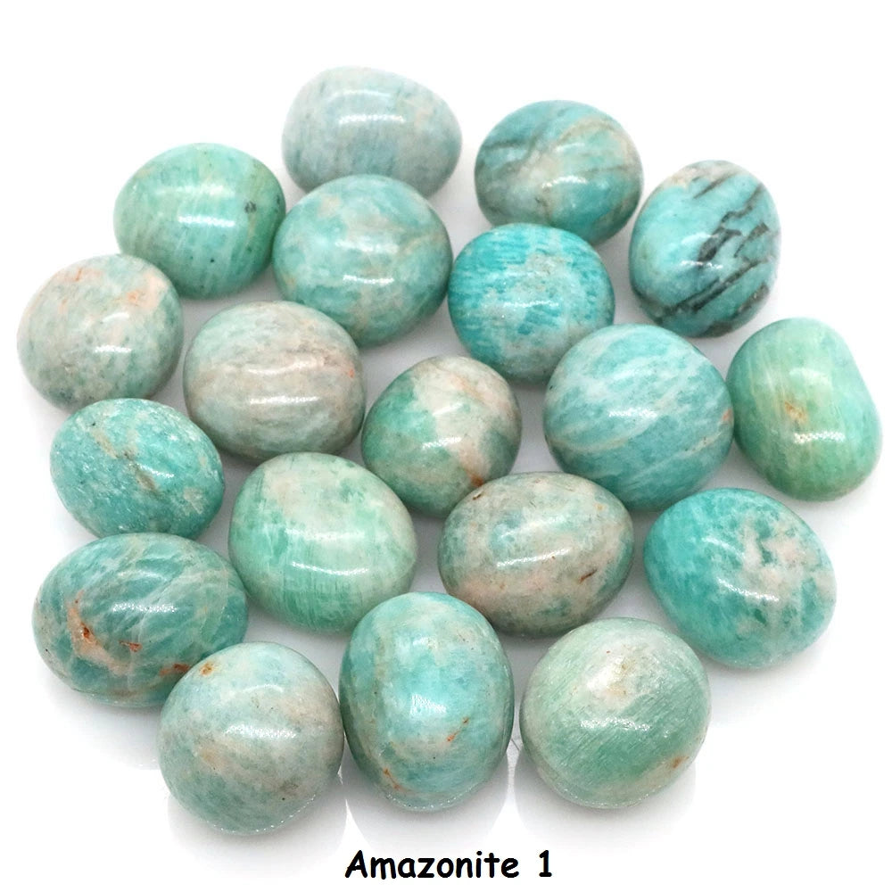 Collection of round Amazonite stones on a white background