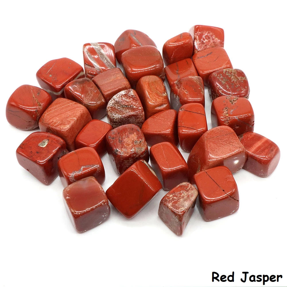 Red jasper stones on a white background