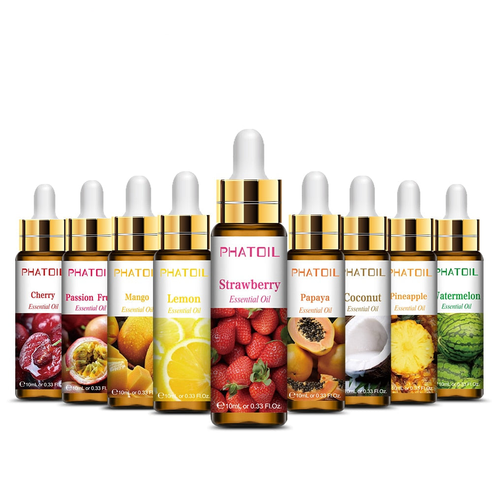 Assorted PHATOIL essential oil dropper bottles with fruit-themed labels on a white background