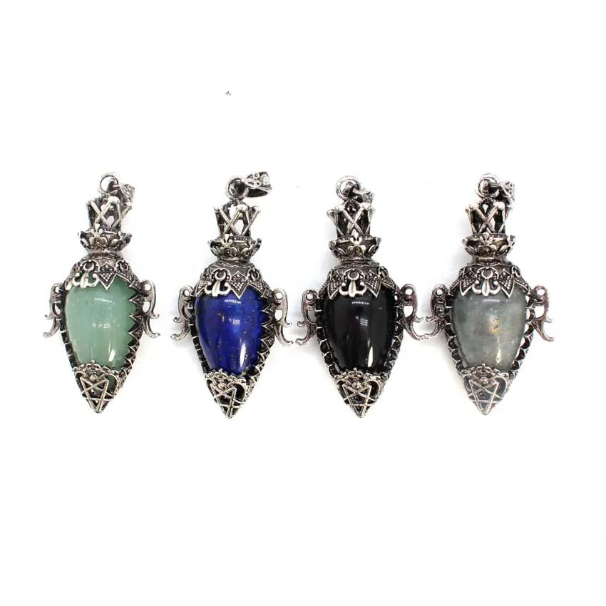 Four gemstone pendants with silver settings on a white background