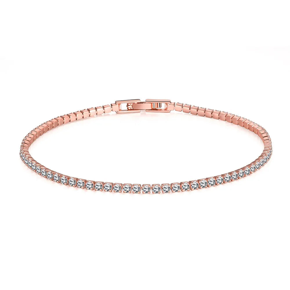 Rose gold bracelet with clear stones on a white background, branded 'MEEKCAT'.